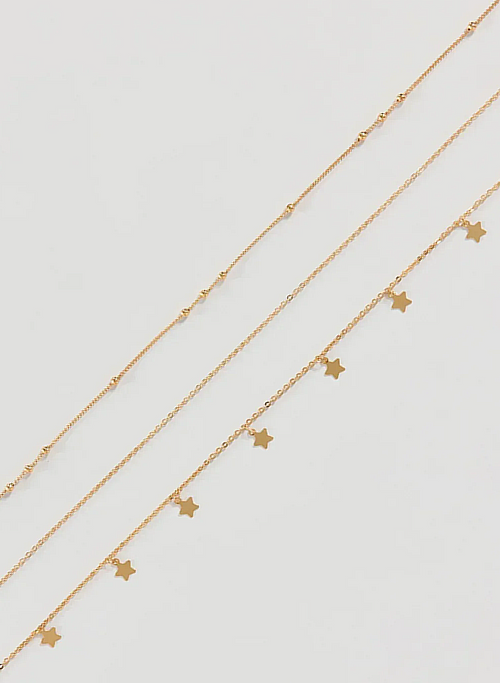 body chain dourada estrelas